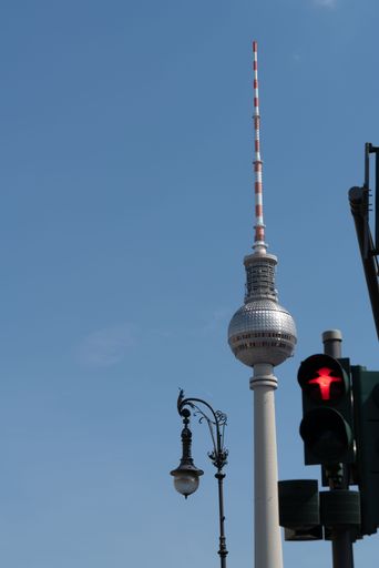 A berlin tv tower with blue sky background