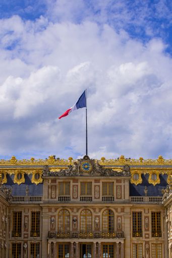 A vertical shot of the Palace of Versailles in France