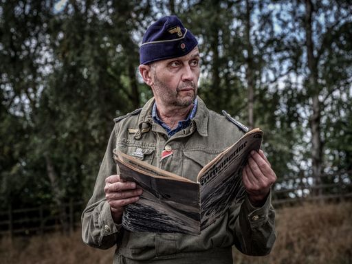 A WW2 reenactor dramatic lighting living history