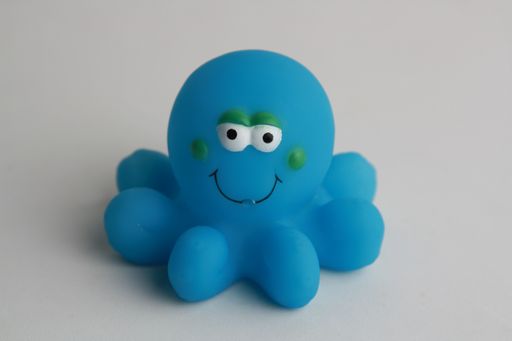 A closeup shot of a toy blue octopus bathtub