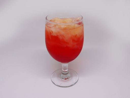 A glass of orange-red syrup with cucumber filling. Suitable for breaking the fast menu or drinks in the summer