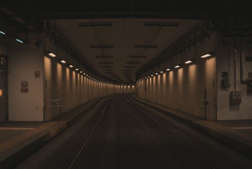 A minimalistic view of the tram tunnel with dim lights