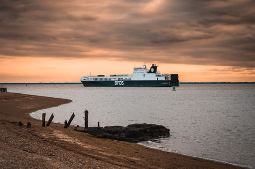 Ferry at sunset  taken from the beach at Landguard Fort. Felixstowe, Suffolk