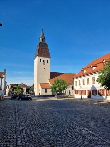 A vertical shot of St. Lorenz in the old center of town Berching, Bavaria, Germany