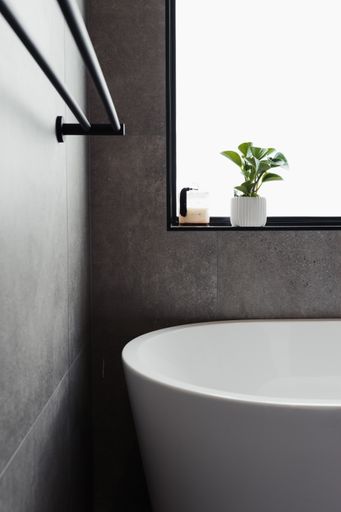 The beautiful and contemporary bathroom with a ceramic bathtub