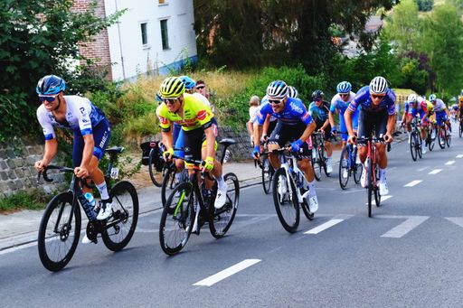 A group of bikers racing on a trail in Huldenberg, Belgium