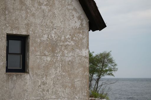 A rural stone house on a seashore