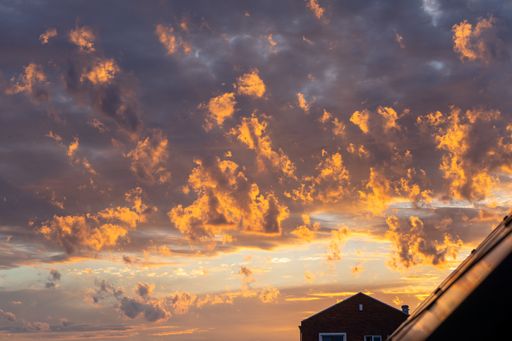 A  beautiful shot of colorful cloudscape over the sea at sunset