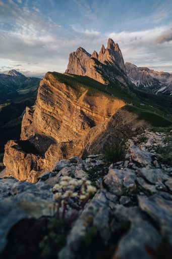 Amazing views of the Dolomites mountain landscape. Sunset view from Seceda over to the Odle mountains. Spectacular dolomitean landscape, Tyrol, Italy.