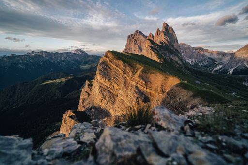 Amazing views of the Dolomites mountain landscape. Sunset view from Seceda over to the Odle mountains. Spectacular dolomitean landscape, Tyrol, Italy.
