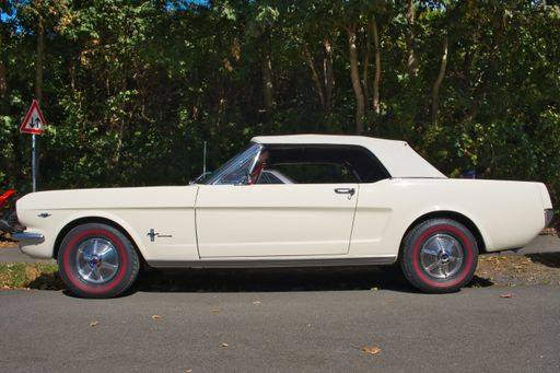 Ford Mustang cabriolet from the sixties, vintage car, side view