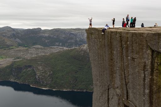 A beautiful shot of people on the top of pulpit at Lysefjord Strand municipality