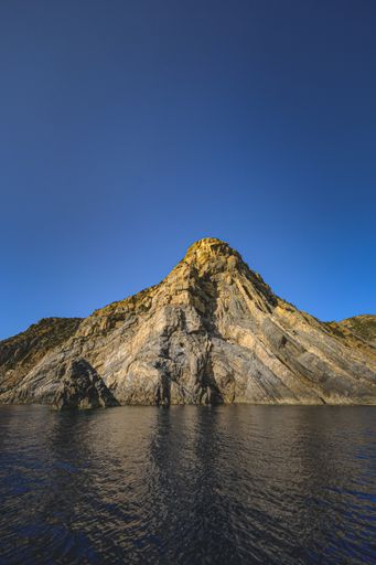 The ocean surrounded by the rocky cliffs  - great for wallpapers