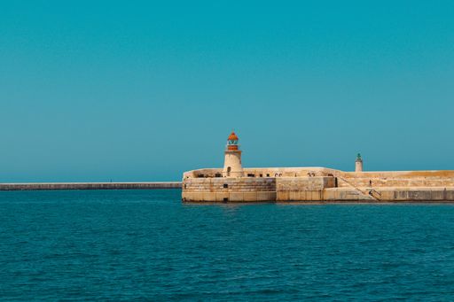 old lighthouse of the port of Valletta, Malta, Europe in the summer
