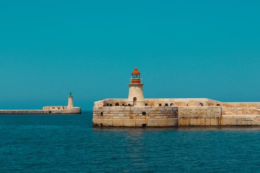 Ricasoli and St. Elmo Lighthouse at harbor in Kalkara near Valletta Grand harbor in Malta, Europe