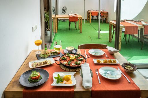 A laid table with various Spanish and Mexican cuisine dishes in the restaurant
