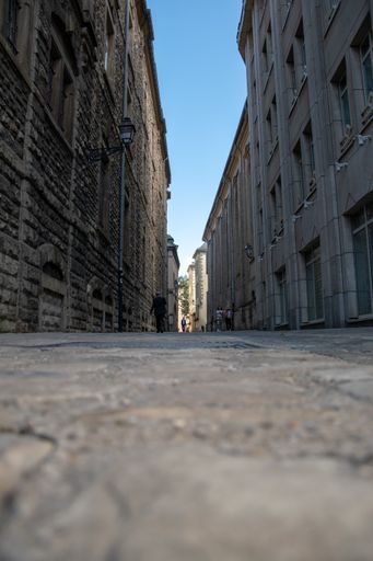 A low angle shot of an old European town street