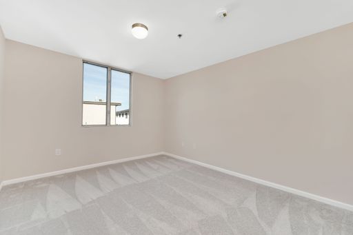 The view of an empty room with beige walls - A house renovation scene