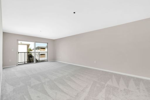 The view of an empty room with beige walls - A house renovation scene