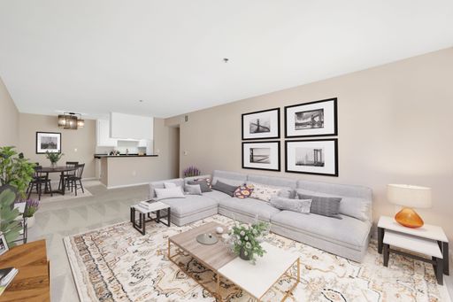 The 3D-rendered view of a wide decorated living room - modern house interior design