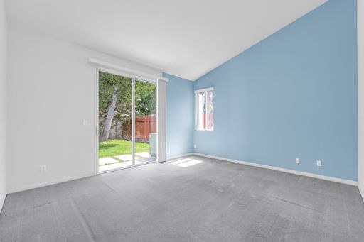 The view of an empty room with blue and white walls - A house renovation scene