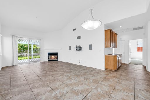 The empty living room and kitchen - A house renovation scene