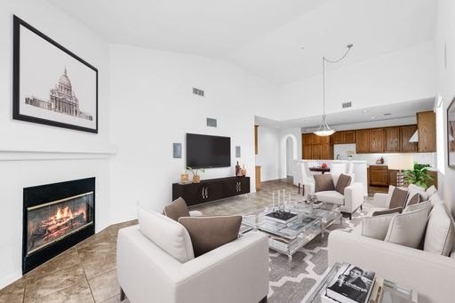 The 3D-rendered view of a wide decorated living room - modern house interior design