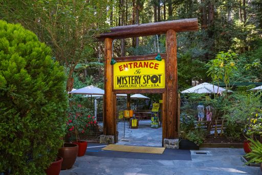 Entrance sign for the Santa Cruz Mystery Spot, a popular historical tourist attraction in the redwoods above Santa Cruz.