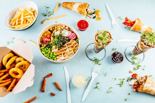 A top view of a variety of super appetizing foods on a table