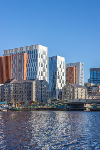 A beautiful view of the Docklands district near the River Liffey on a sunny day in Dublin, Ireland