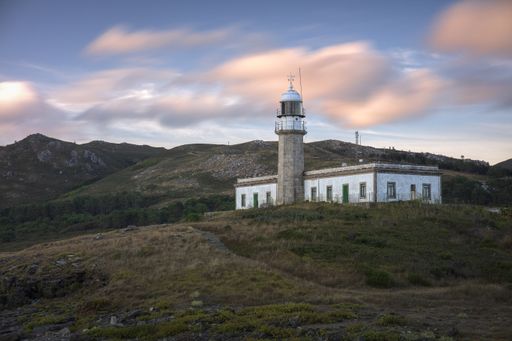 A mesmerizing view of Punta Insua or Larino lighthouse in Carnota, Galicia, Spain