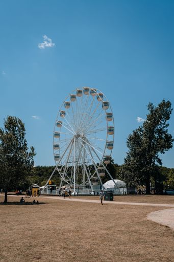 A vertical shot of the Ferris wheel at the Electric Castle Festival in Cluj-Napoca.