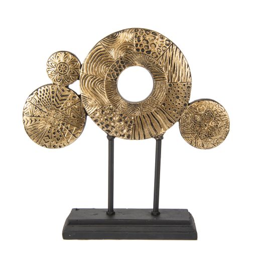 An abstract luxury interior accessory of golden circles with patterns on a black stand