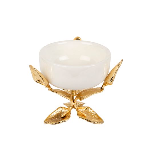 A closeup of a small ceramic vase with gold leaves on a white background