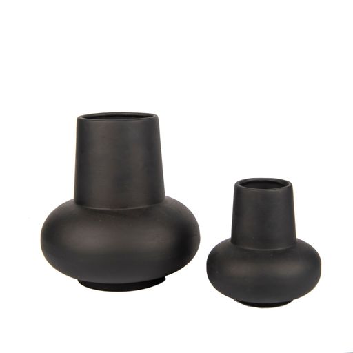 Two minimalistic black ceramic vases on a white background - decoration for an interior