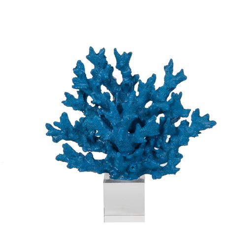 An abstract blue coral figure accessory on a glass stand isolated on white background - decoration for an interior