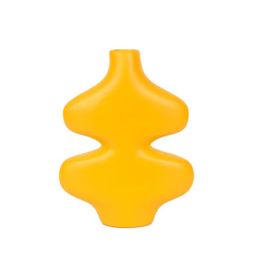 An abstract yellow ceramic vase with curve outlines - interior decoration