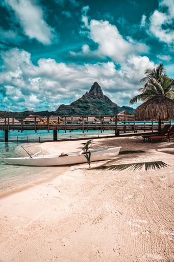 A vertical shot of the tropical coastline of Bora Bora