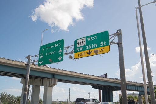 Exit Sign to Miami International Airport and LeJune Rode.