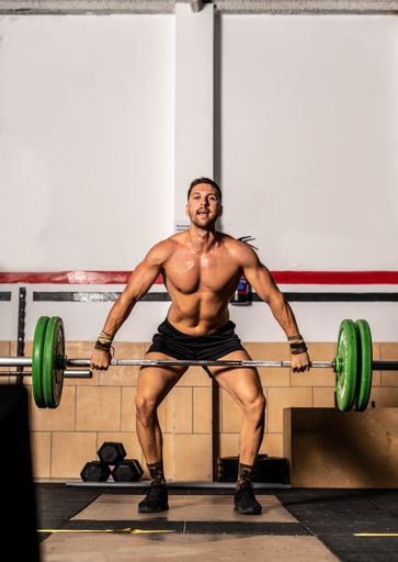 A vertical shot of an athletic male