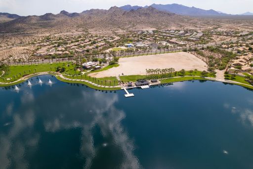 An aerial drone shot of Estrella Mountain Ranch and the North Lake in Starpoint Residents Club, Arizona