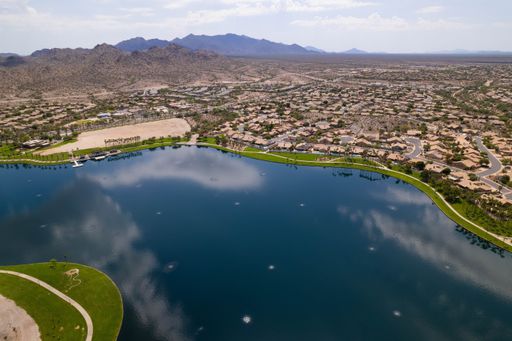 An aerial view of North Lake and Goodyear, Arizona cityscape with mountains in the background