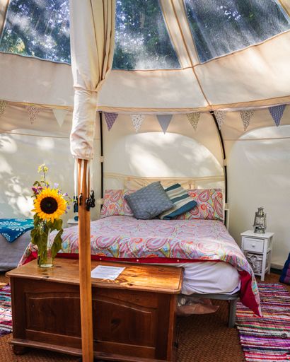 A beautiful interior view of a tent-style hotel room