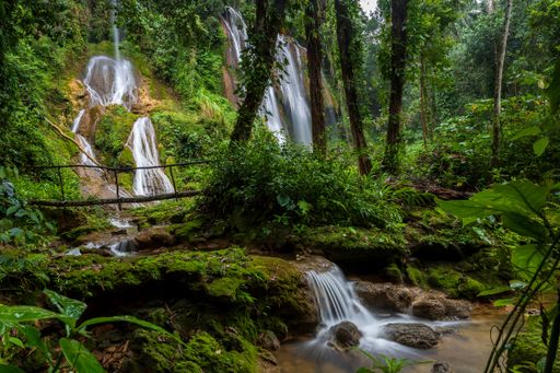 A landscape of cascading waterfalls in Gran Parque Natural Topes de Collantes park in Cuba
