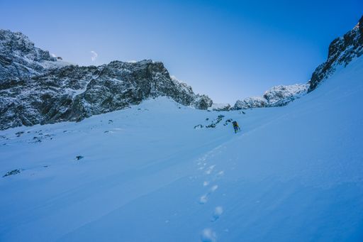 A breathtaking view of the magnificent mountains covered in snow under the blue sky in Slovakia