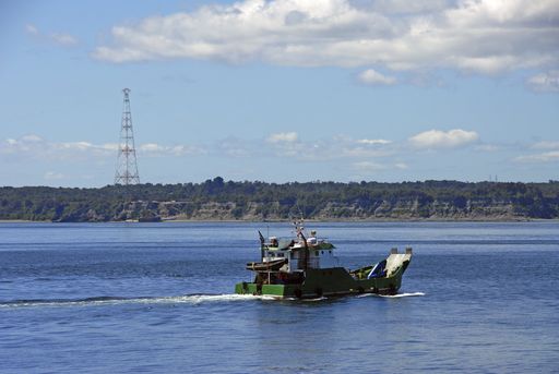A mesmerizing shot of a beautiful seascape with a boat at daytime