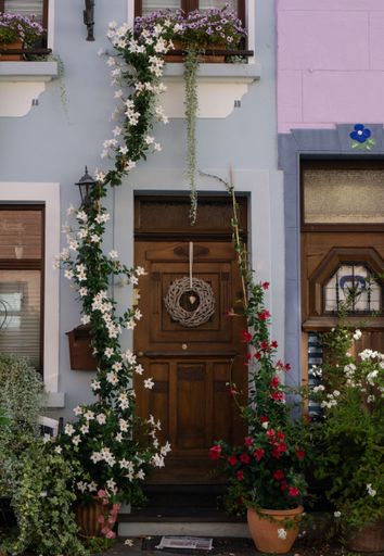A house with flowers on the windowsills in Krefeld-Linn, Germany