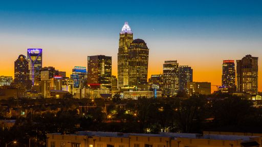 A beautiful shot of illuminated downtown buildings at night in Charlotte, USA