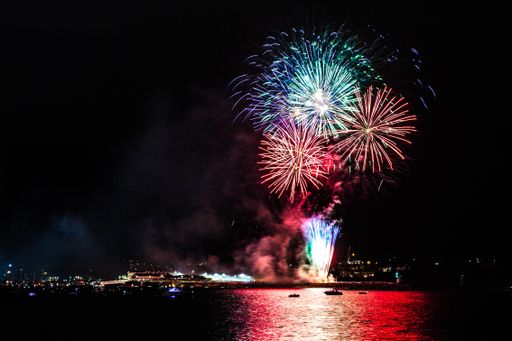 A beautiful shot of a firework in Plymouth with the city panorama