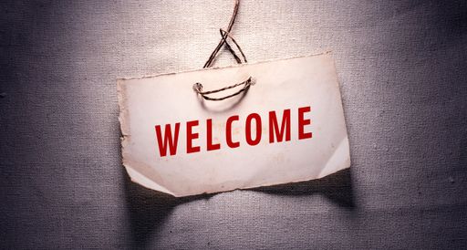 Close up conceptual shot of a business idea showing Welcome
